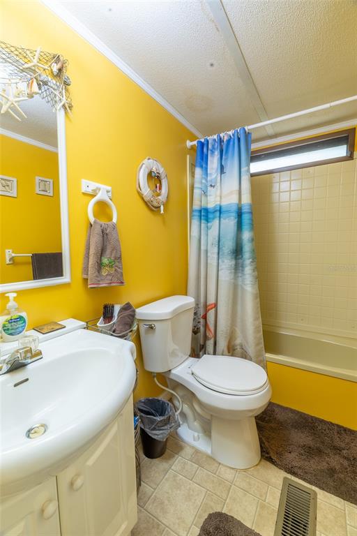 591 Marshburn Drive Bronson, FL 32621 - Photo 46 of 69 a bathroom with a sink toilet and shower