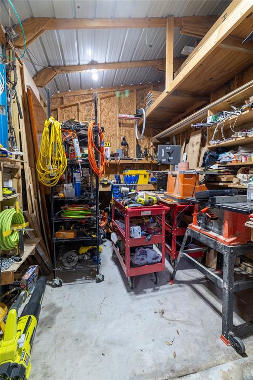 591 Marshburn Drive Bronson, FL 32621 - Photo 58 of 69 a view of a storage room with racks