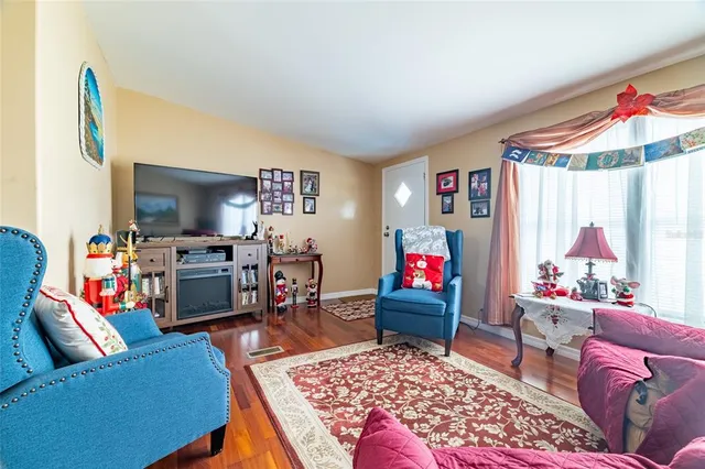 a living room with furniture and a couch