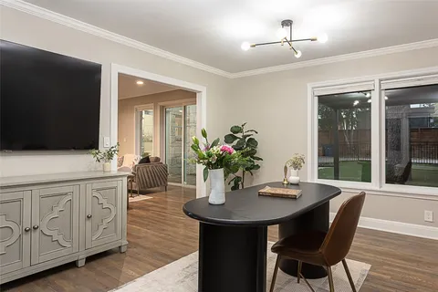 a view of a patio with couches and a potted plant