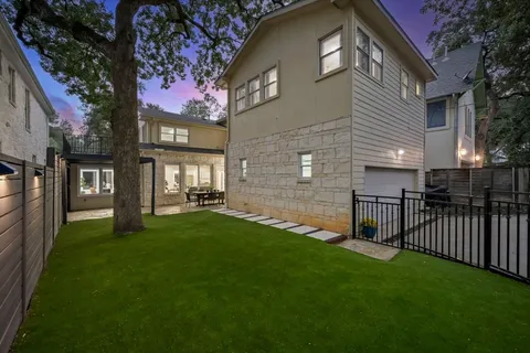 a front view of a house with a garage