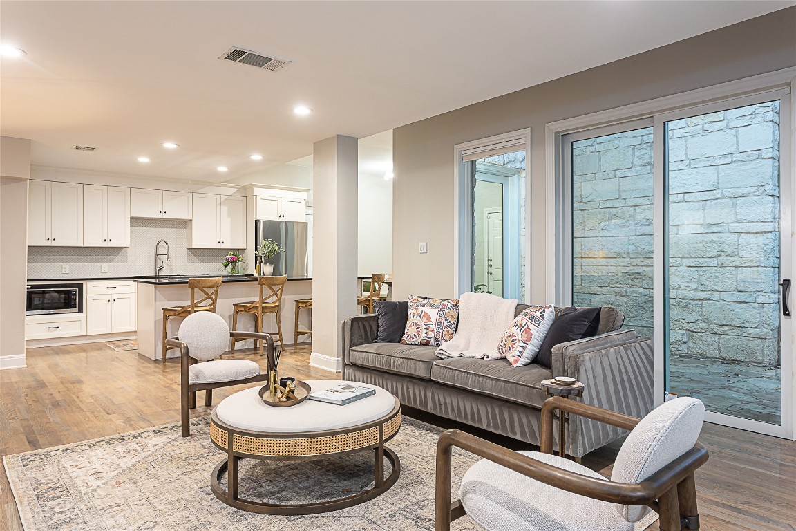 3210 Enfield Road Austin, TX 78703 - Photo 9 of 26 Living area with sliding glass doors to outdoor living