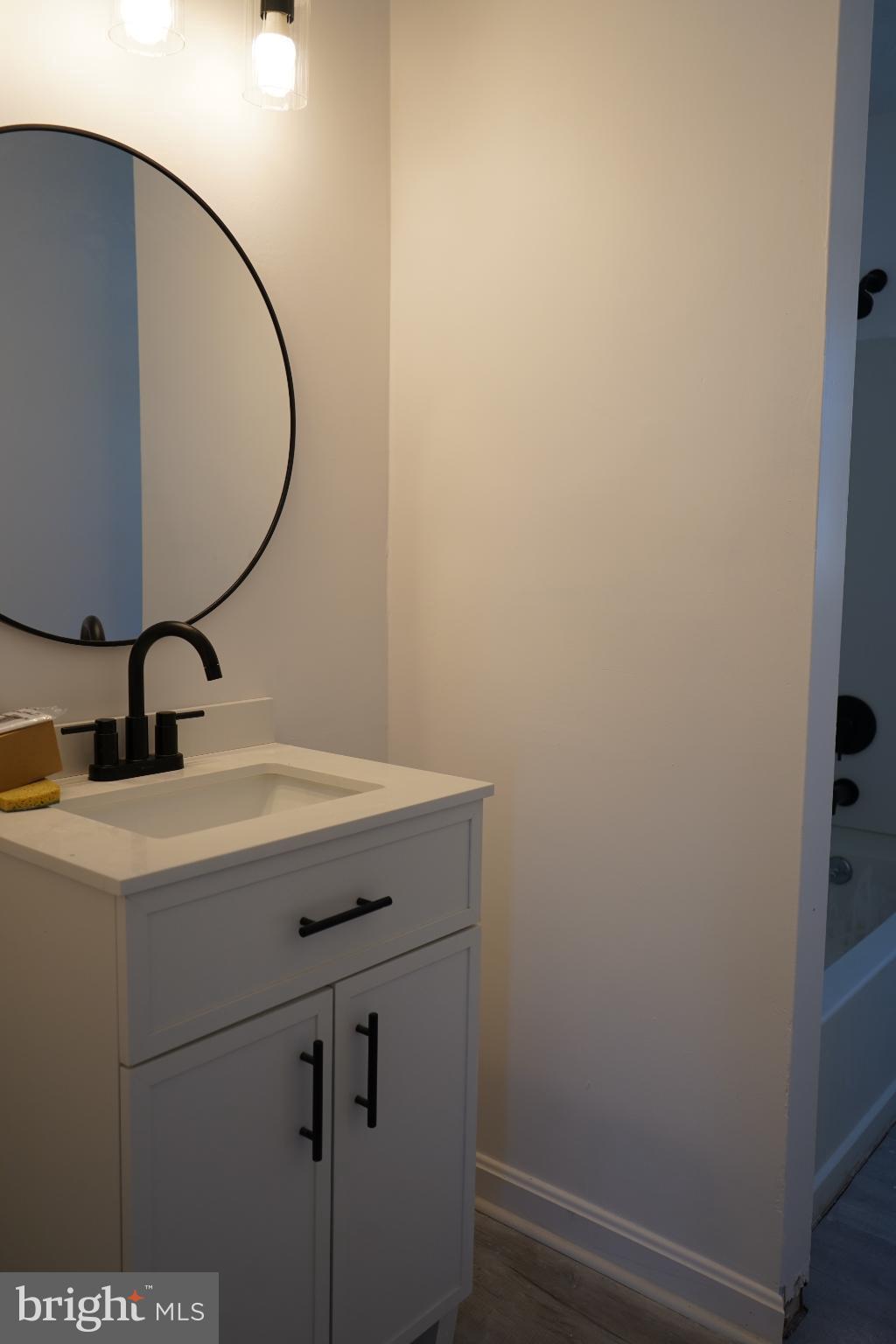 15604 Glen Ella Road Culpeper, VA 22701 - Photo 13 of 34 Sleek modern bathroom with elegant fixtures.