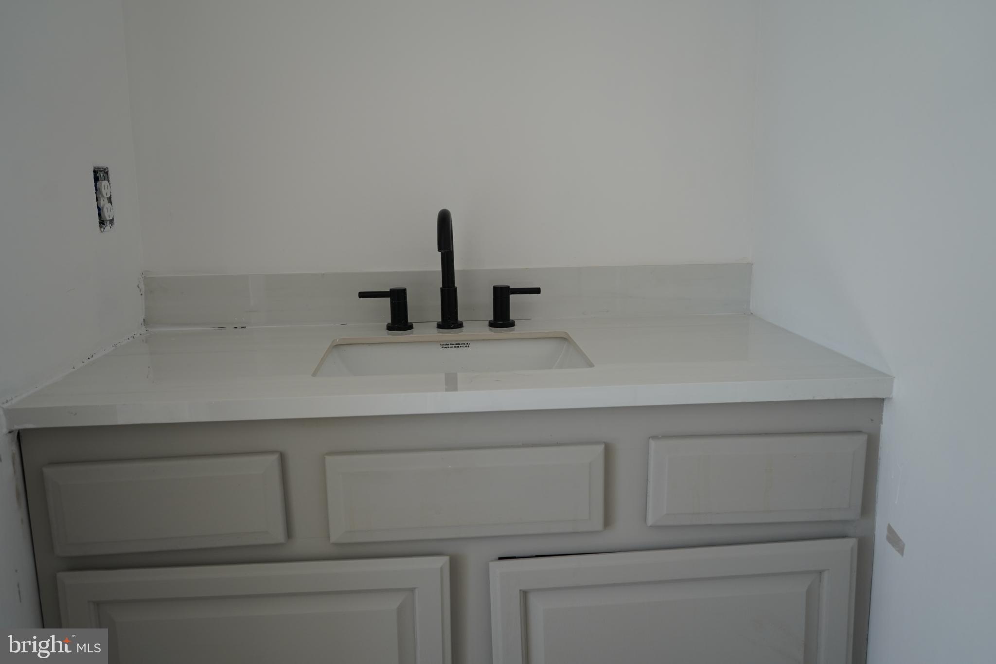 15604 Glen Ella Road Culpeper, VA 22701 - Photo 18 of 34 Sleek modern vanity with elegant fixtures.