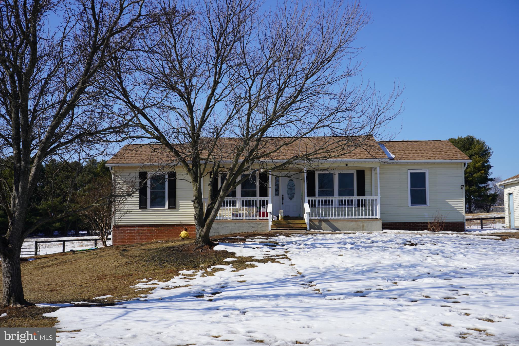 15604 Glen Ella Road Culpeper, VA 22701 - Photo 3 of 34 Charming home nestled in a snowy landscape.