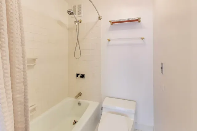 a view of a building with an ocean view