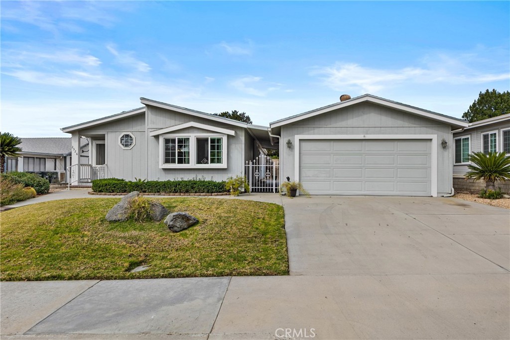 2526 Peach Tree Street Hemet, CA 92545 - Photo 1 of 1 a front view of a house with a yard