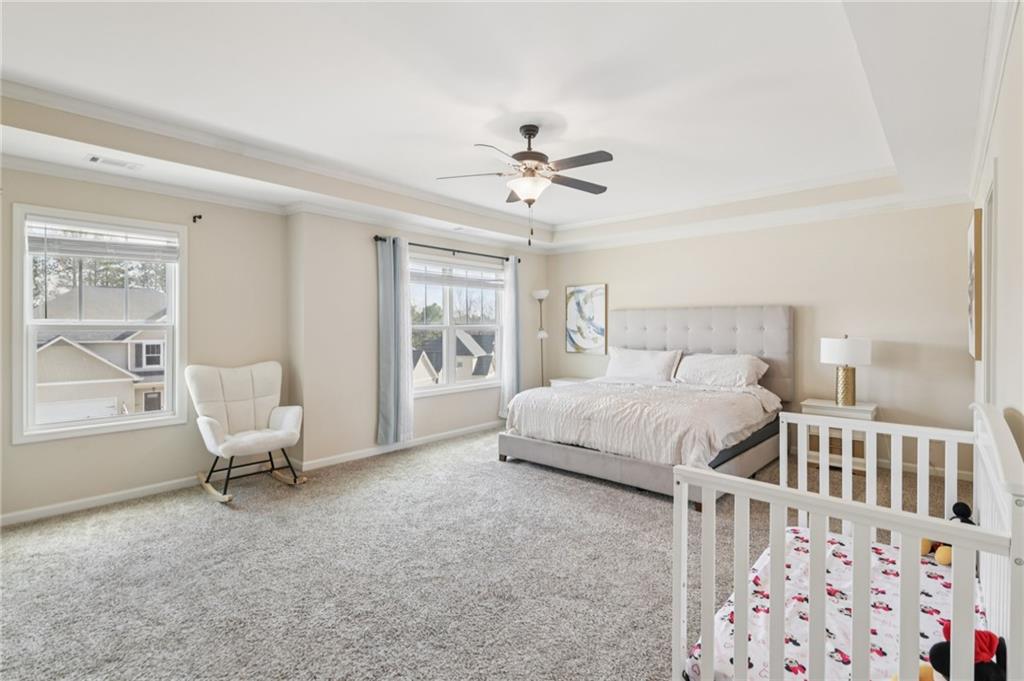 1120 Red Bud Circle Villa Rica, GA 30180 - Photo 12 of 31 a bedroom with a bed and a window
