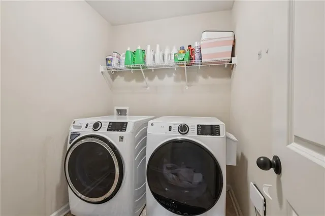 a utility room with dryer and washer