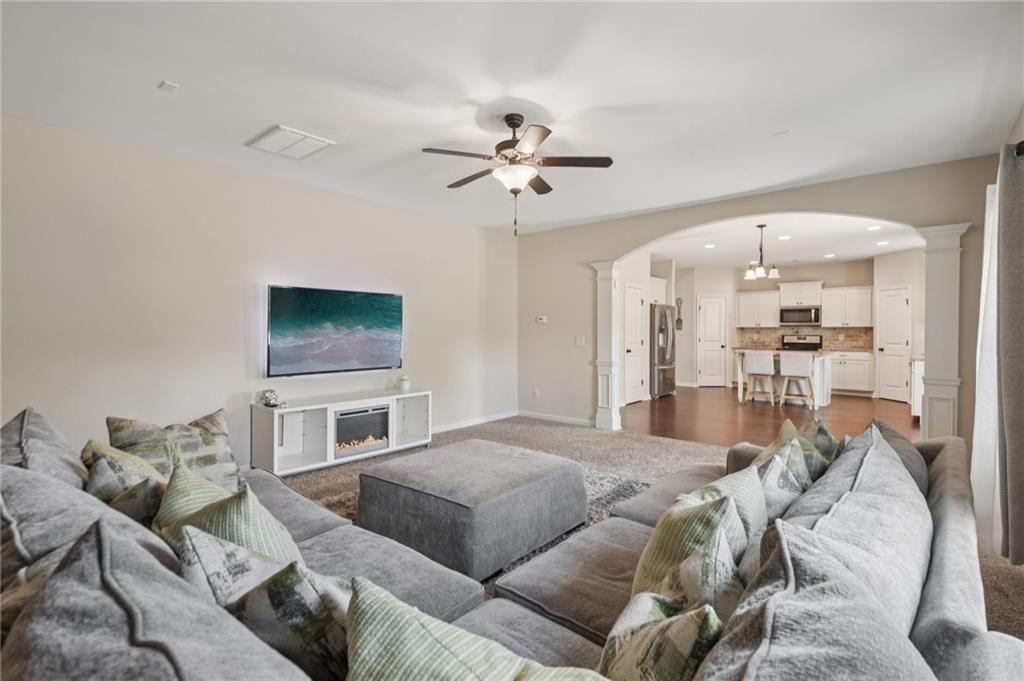 1120 Red Bud Circle Villa Rica, GA 30180 - Photo 6 of 31 a living room with furniture and a flat screen tv