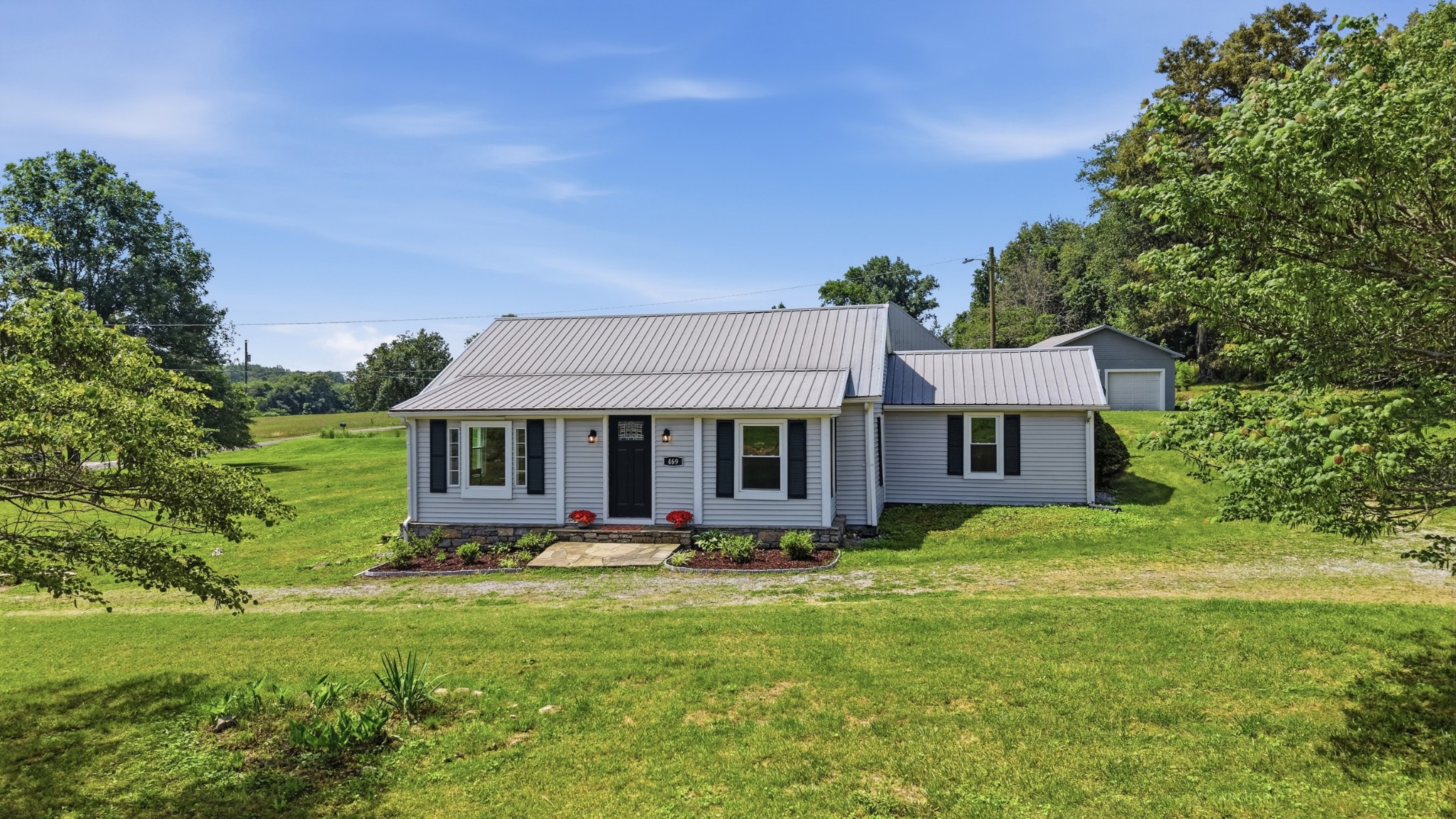 469 Fred Cooper Road McMinnville, TN 37110 - Photo 42 of 46 a view of a house with a yard balcony and a tree