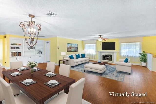 a view of a bathroom with a sink and a mirror