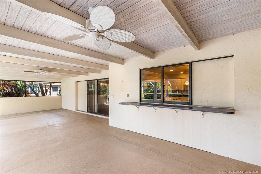 3181 Southeast Fairway West Stuart, FL 34997 - Photo 53 of 64 a view of a room with a large window