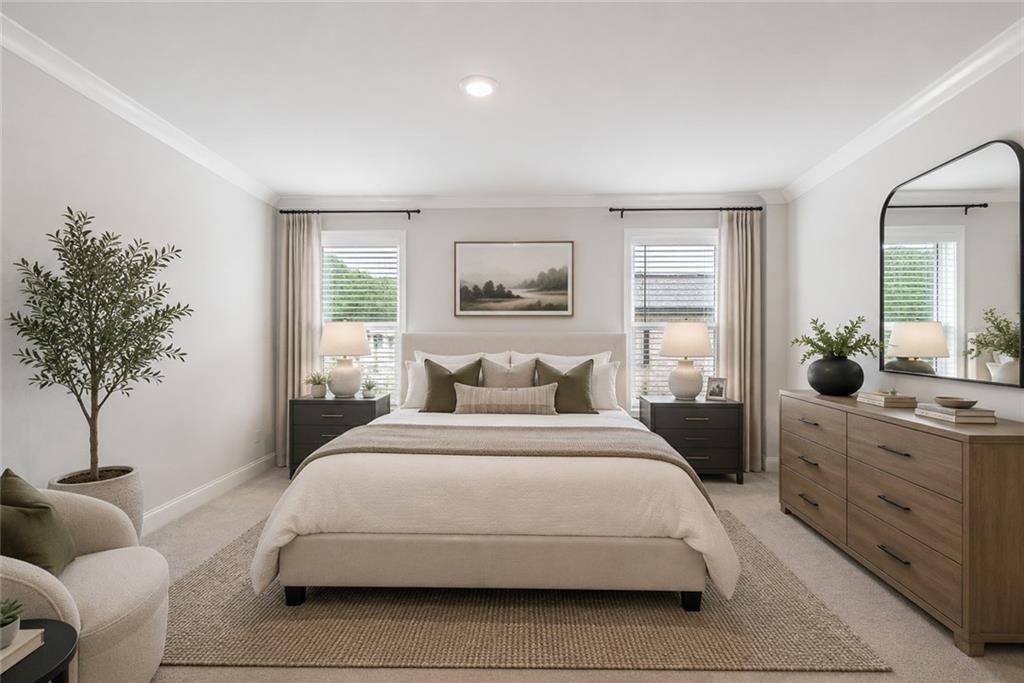 3334 Swallowtail Terrace Duluth, GA 30096 - Photo 5 of 37 a bedroom with a large bed and a potted plant