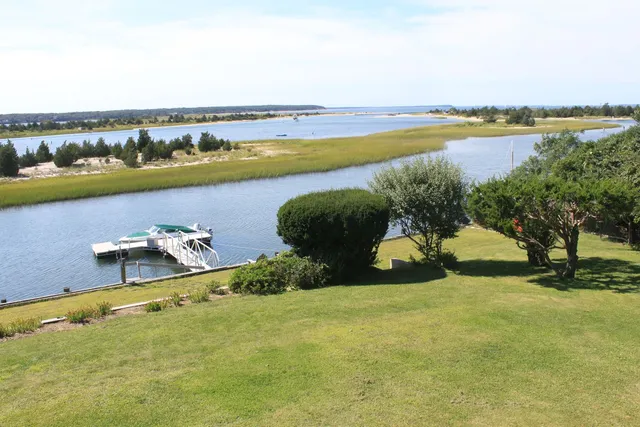 a view of a lake with a nearby beach