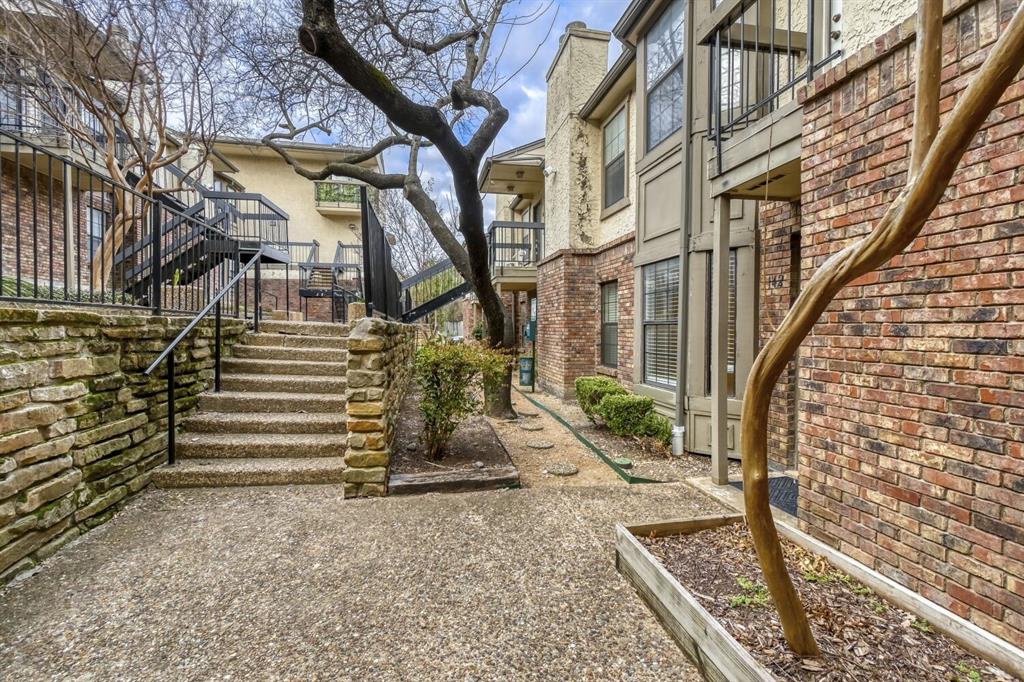 8750 Park Lane, Unit 142 Dallas, TX 75231 - Photo 17 of 17 Shared courtyard for both privacy and blocking of the weather.