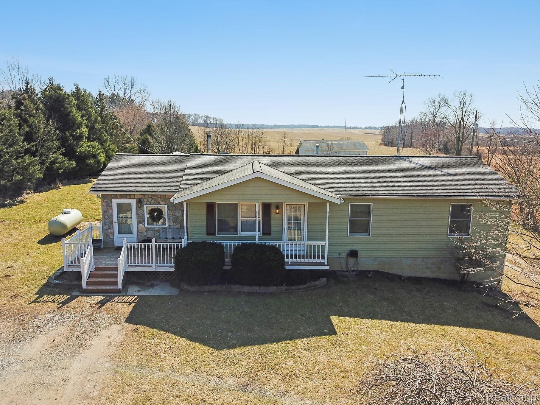 10675 Bell Oak Road Fowlerville, MI 48836 - Photo 29 of 39 Front Aerial View