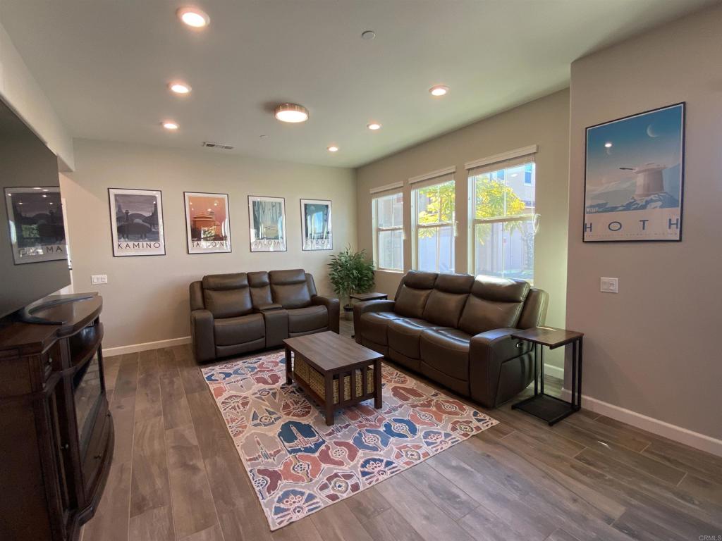 1077 Delpy View Point Vista, CA 92084 - Photo 1 of 1 a living room with furniture and a window