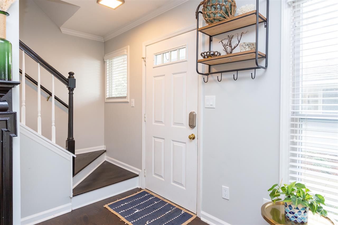 1462 Barton Pl Drive Raleigh, NC 27608 - Photo 17 of 25 a view of an entryway with wooden floor