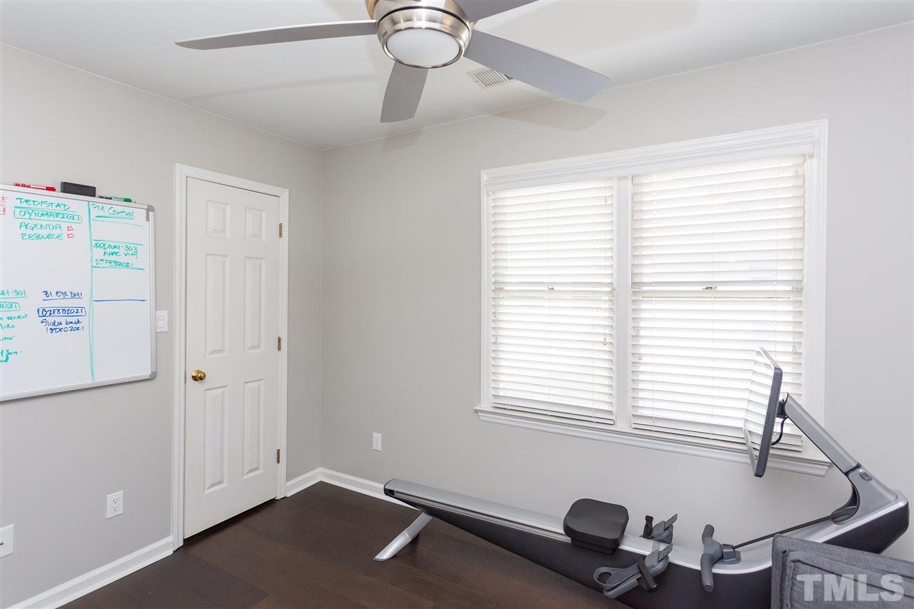 1462 Barton Pl Drive Raleigh, NC 27608 - Photo 21 of 25 a view of a room with gym equipment
