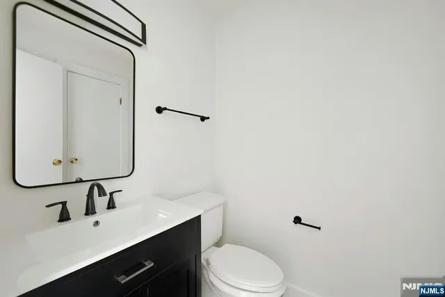 a view of a hallway with front door