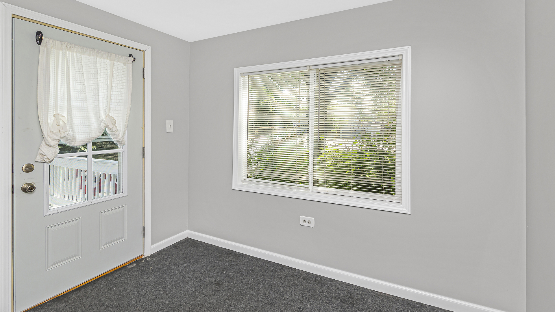 26058 West Rollins Road Ingleside, IL 60041 - Photo 4 of 18 a view of an empty room with a window