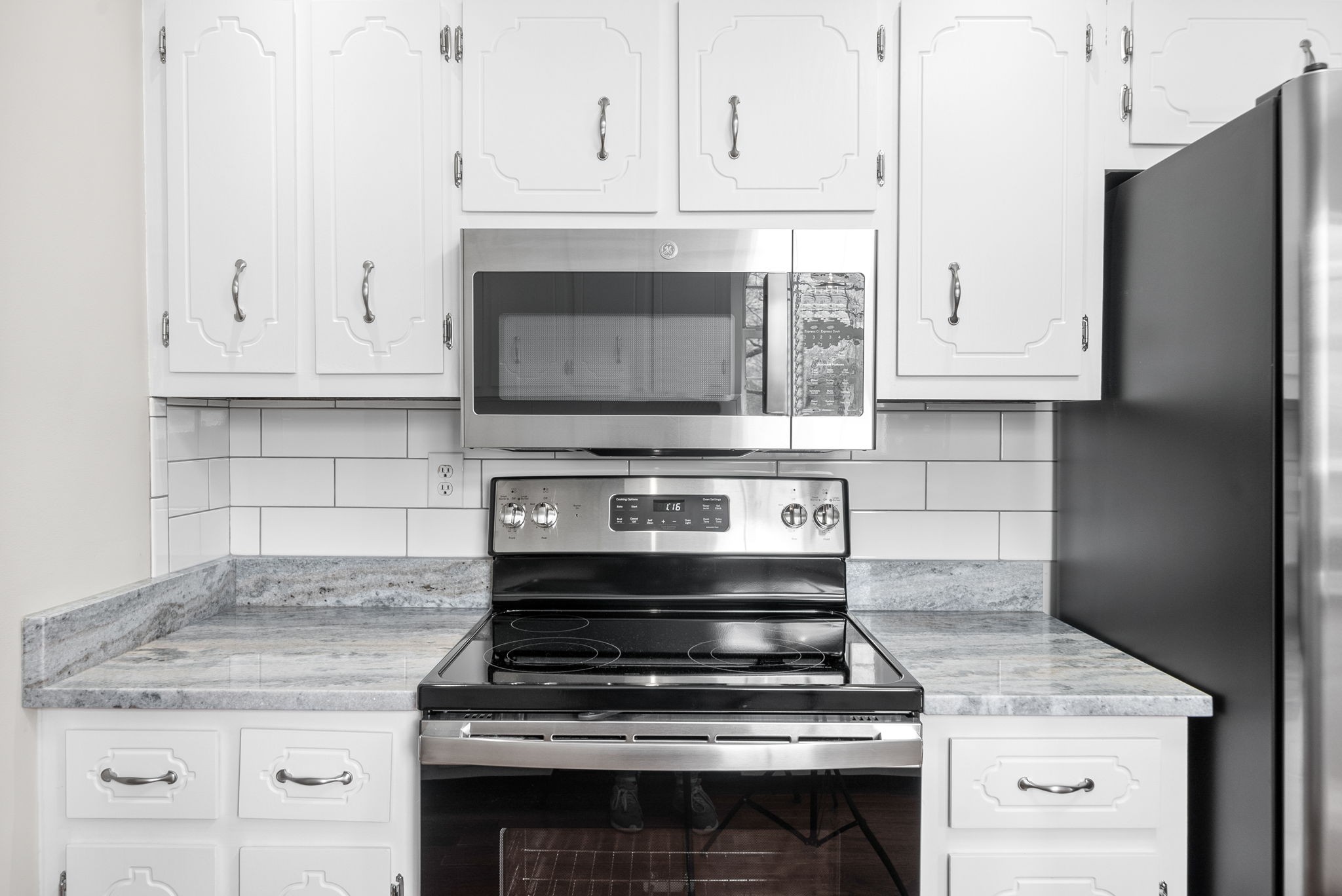 135 Carl Taylor Road Tennessee Ridge, TN 37178 - Photo 13 of 41 a stove top oven sitting inside of a kitchen