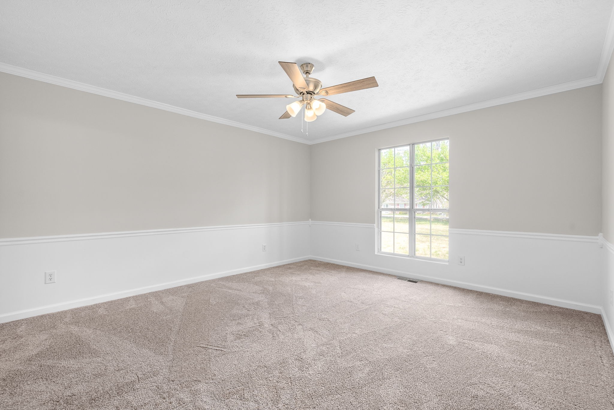 135 Carl Taylor Road Tennessee Ridge, TN 37178 - Photo 15 of 41 an empty room with a window and a ceiling fan