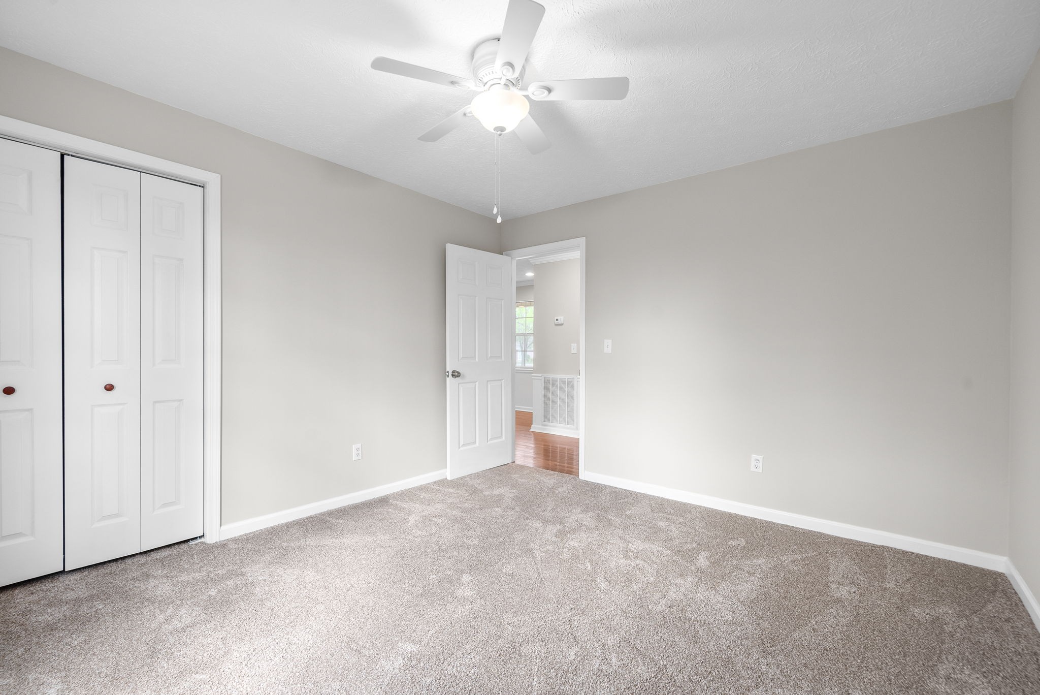 135 Carl Taylor Road Tennessee Ridge, TN 37178 - Photo 20 of 41 a view of an empty room and a ceiling fan window
