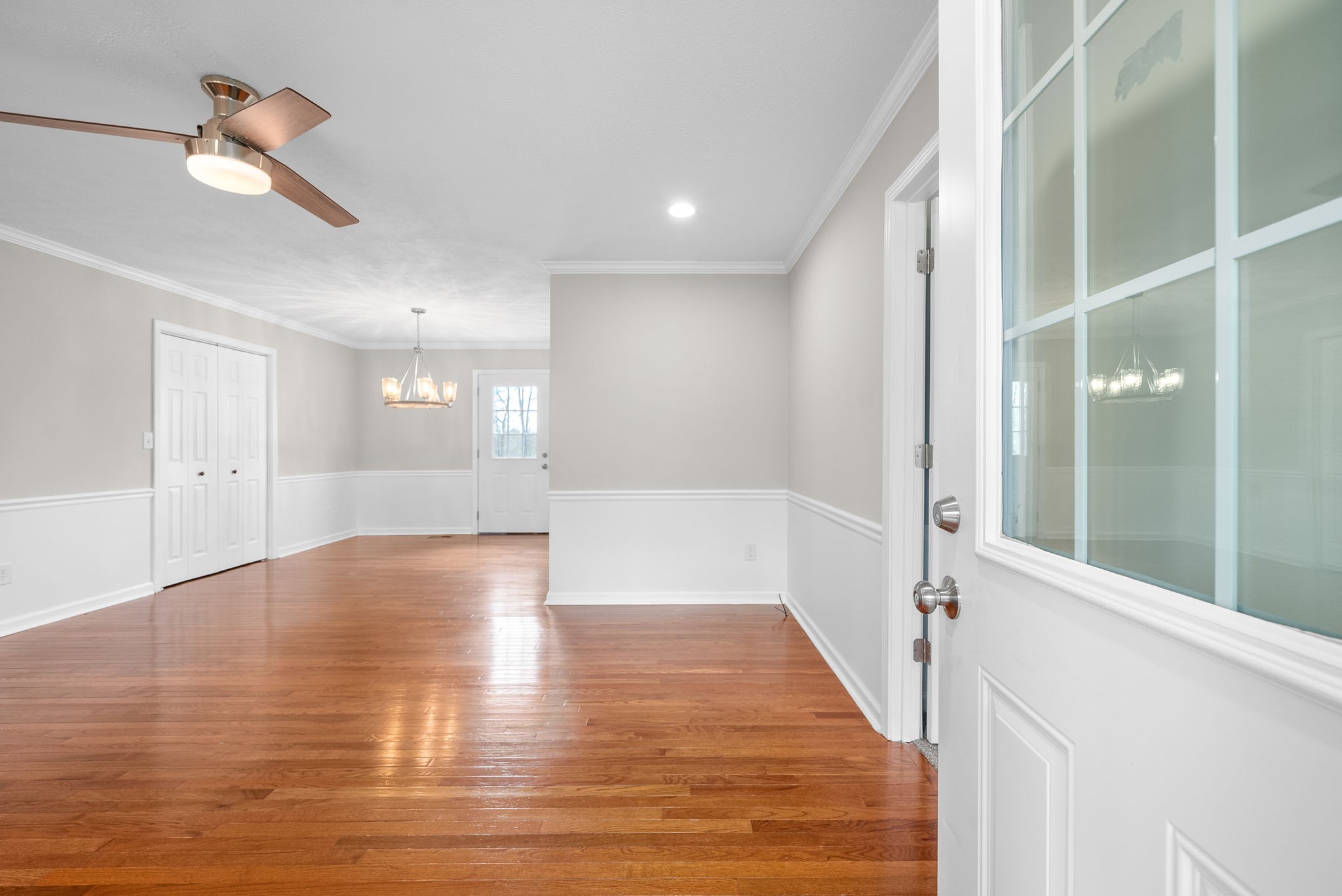 135 Carl Taylor Road Tennessee Ridge, TN 37178 - Photo 4 of 41 a view of a hallway with wooden floor and a bathroom
