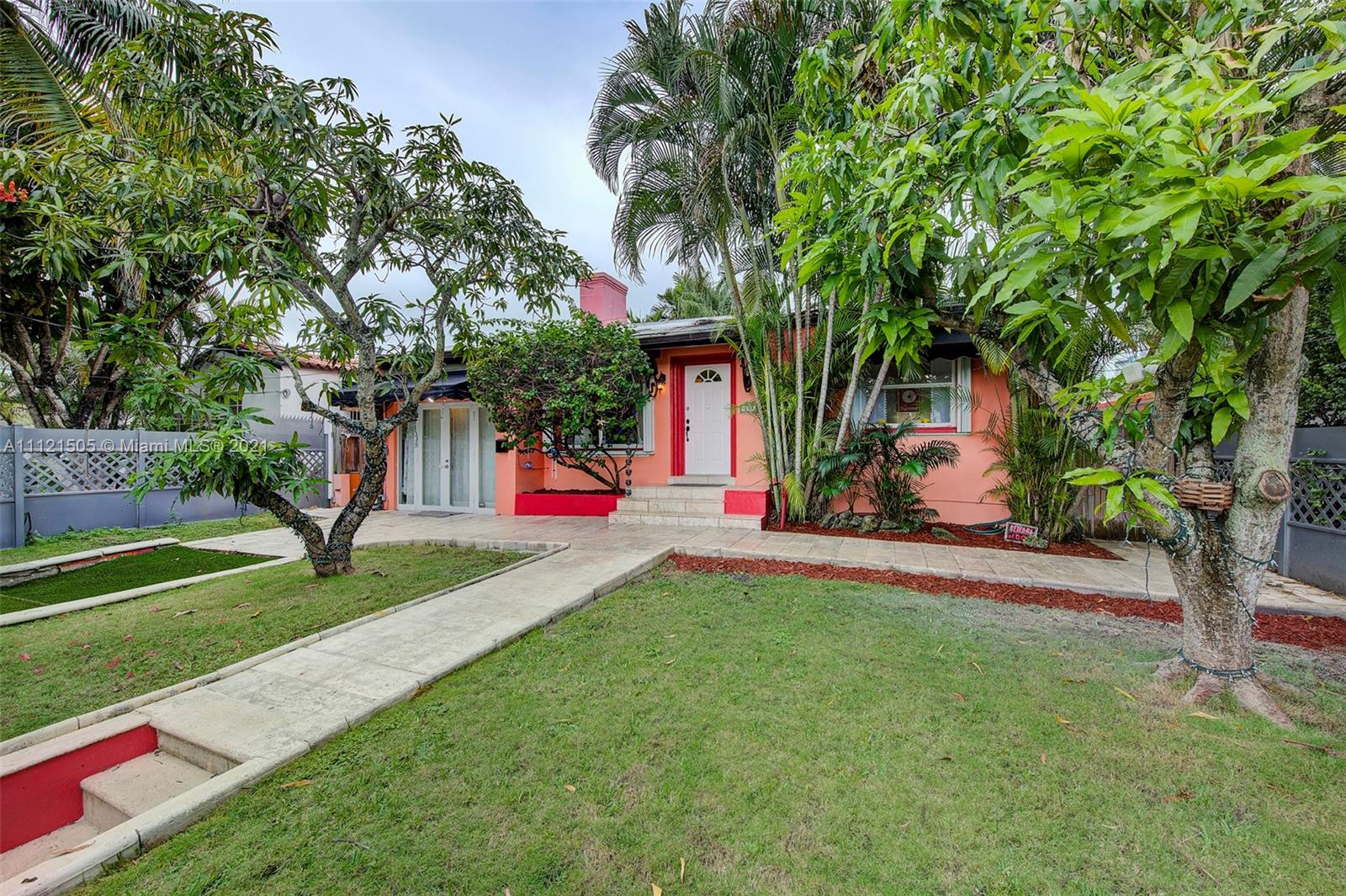 331 Southwest 19th Road Miami, FL 33129 - Photo 3 of 22 a view of green field