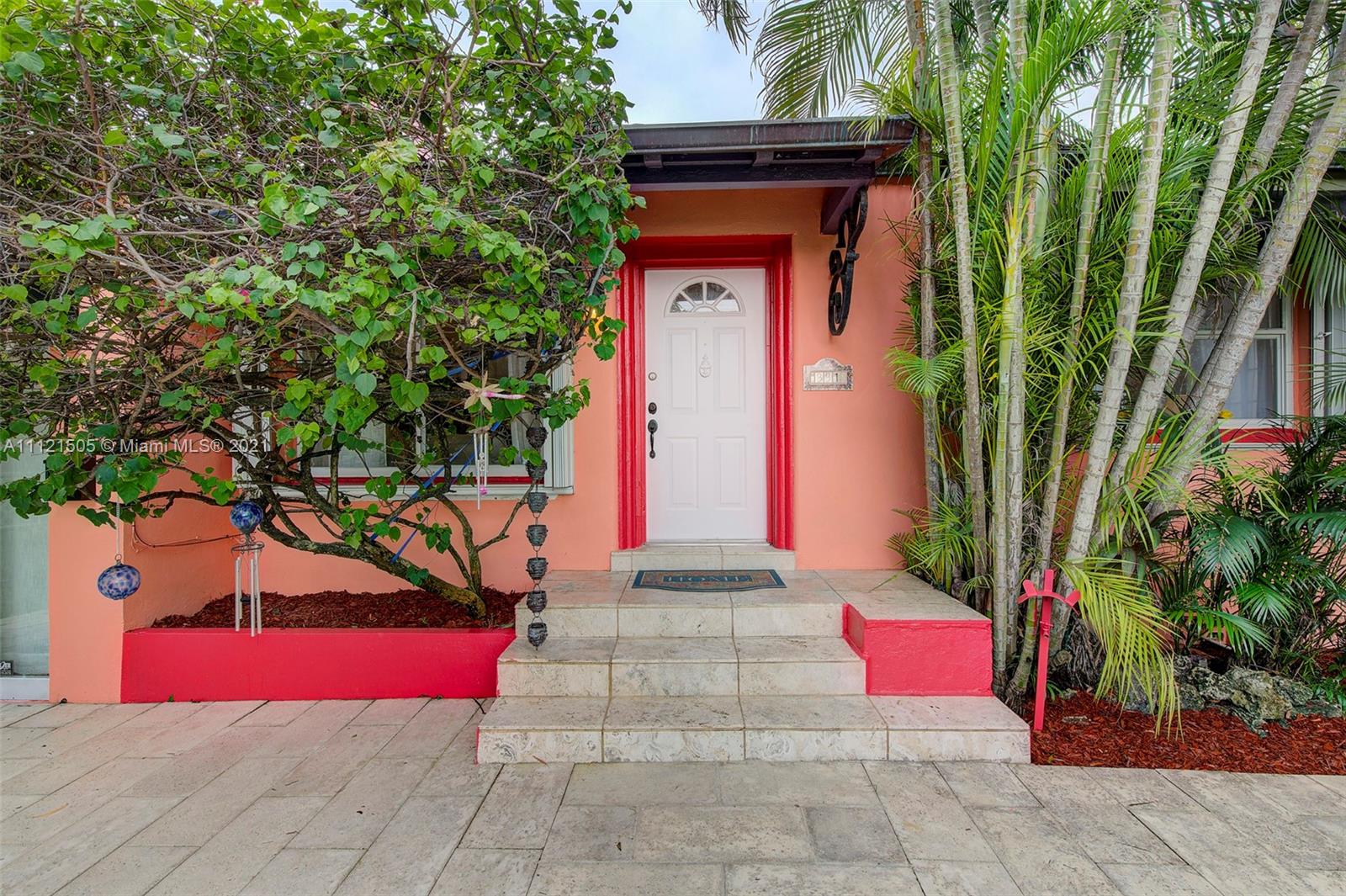 331 Southwest 19th Road Miami, FL 33129 - Photo 4 of 22 a building with trees in front of it