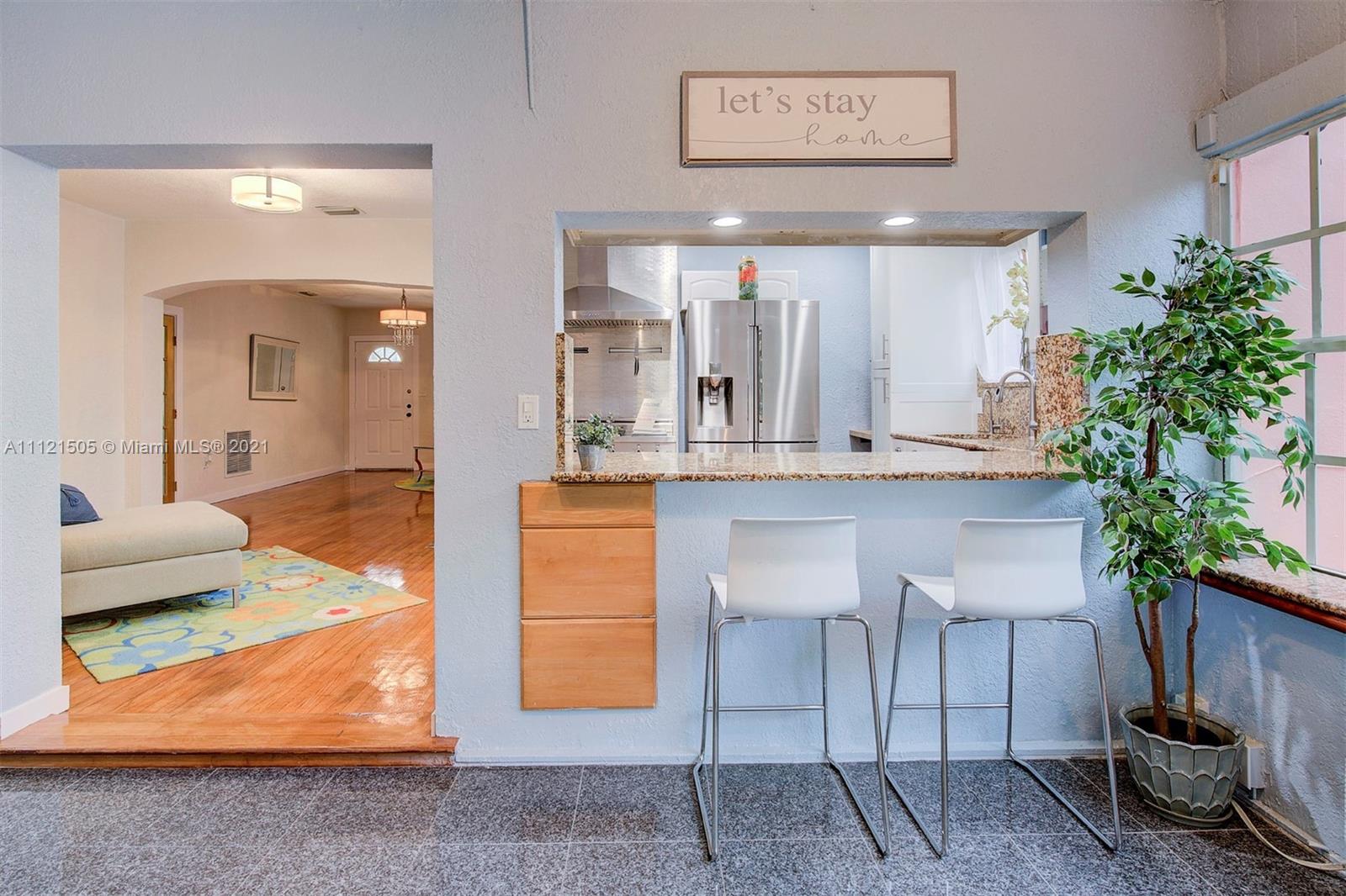 331 Southwest 19th Road Miami, FL 33129 - Photo 10 of 22 a lobby with furniture and potted plant