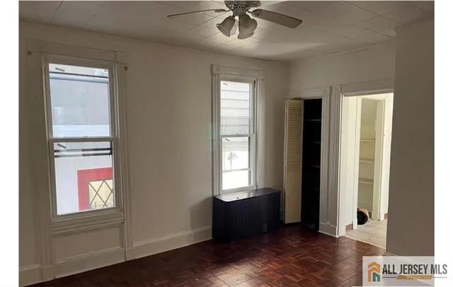 a view of an empty room and window