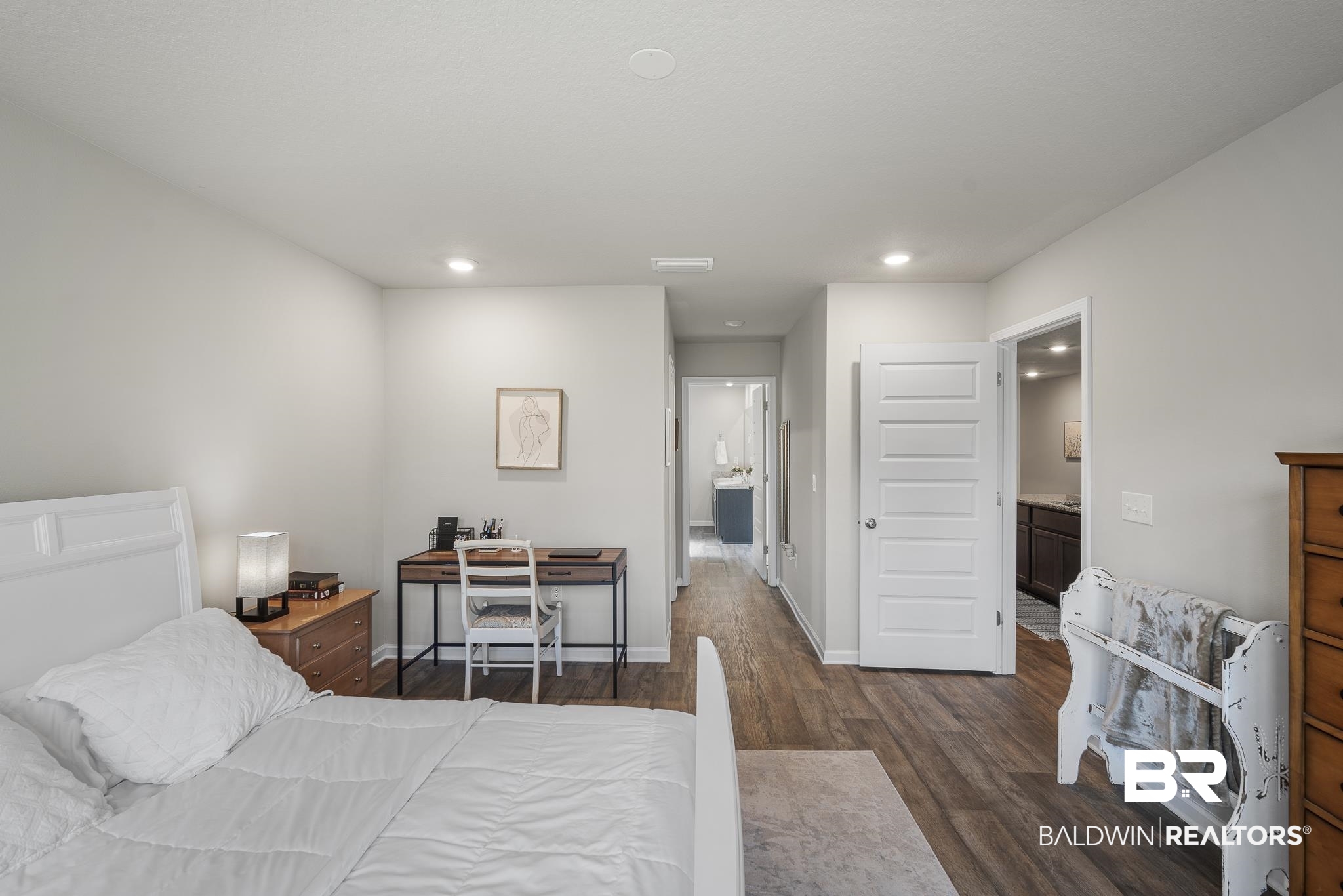 10232 Brodick Loop Spanish Fort, AL 36527 - Photo 15 of 29 Bedroom featuring dark wood-style flooring, recessed lighting, baseboards, and connected bathroom
