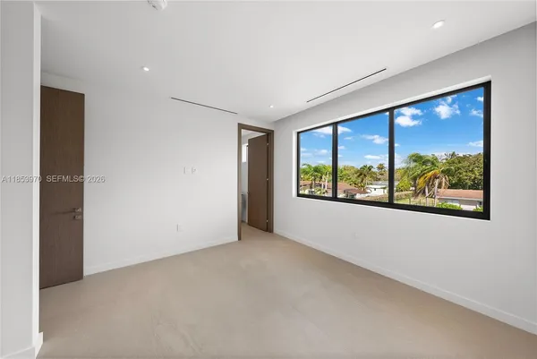 a view of a room that has a window