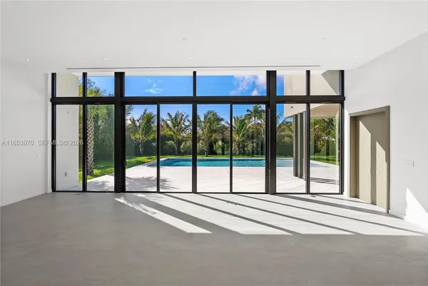 a view of a room with a large window