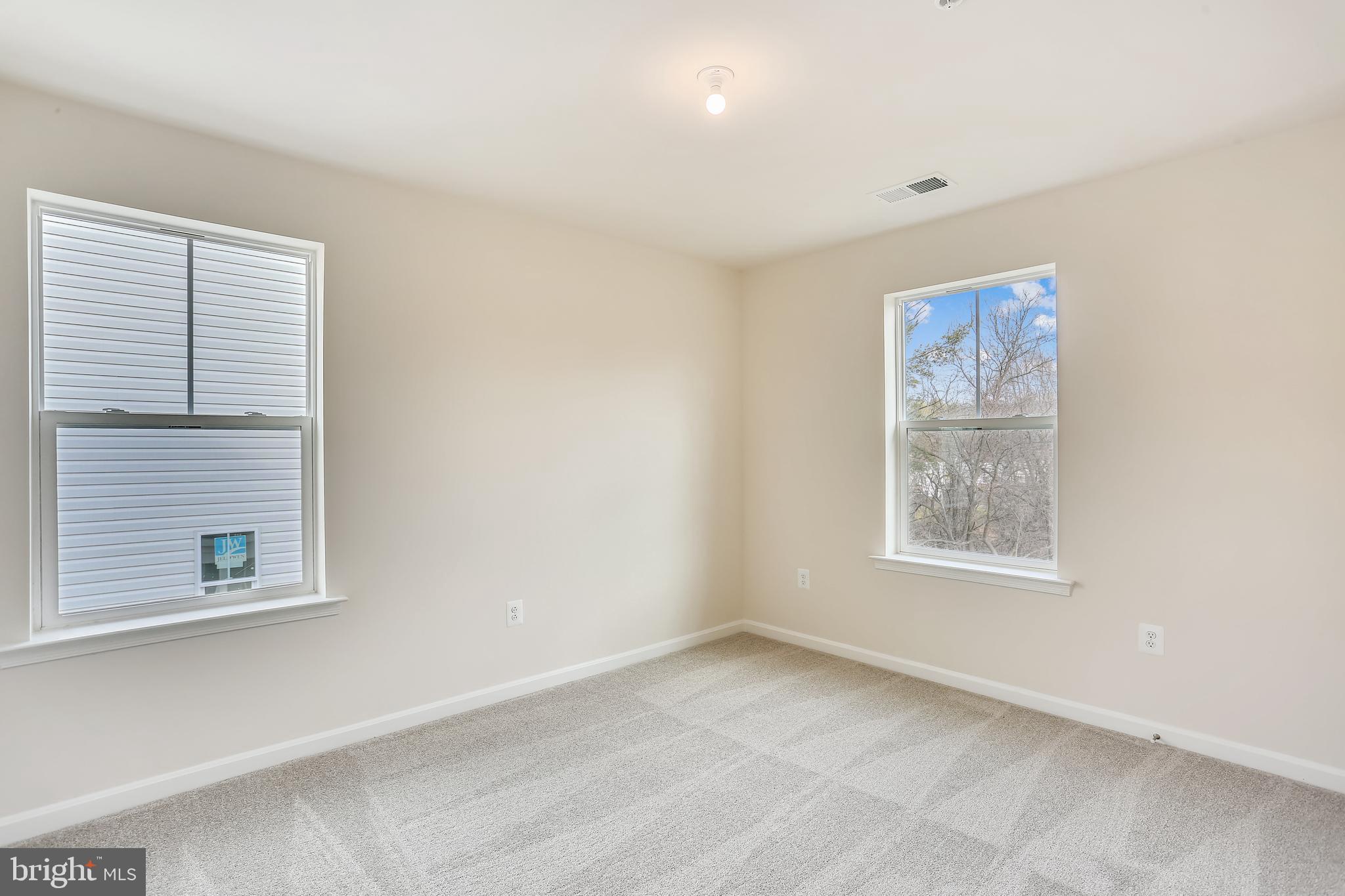 Cornfield Road Pasadena, MD 21122 - Photo 22 of 37 an empty room with a window