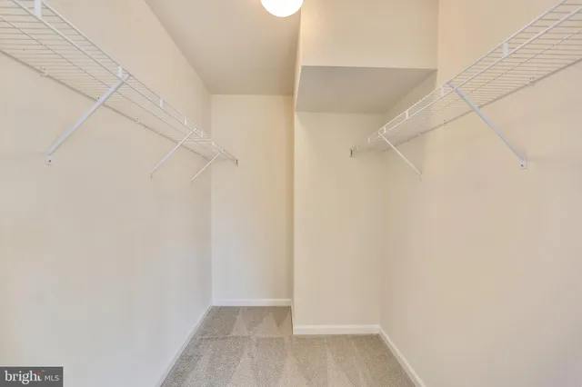 a view of small space with racks on the wall