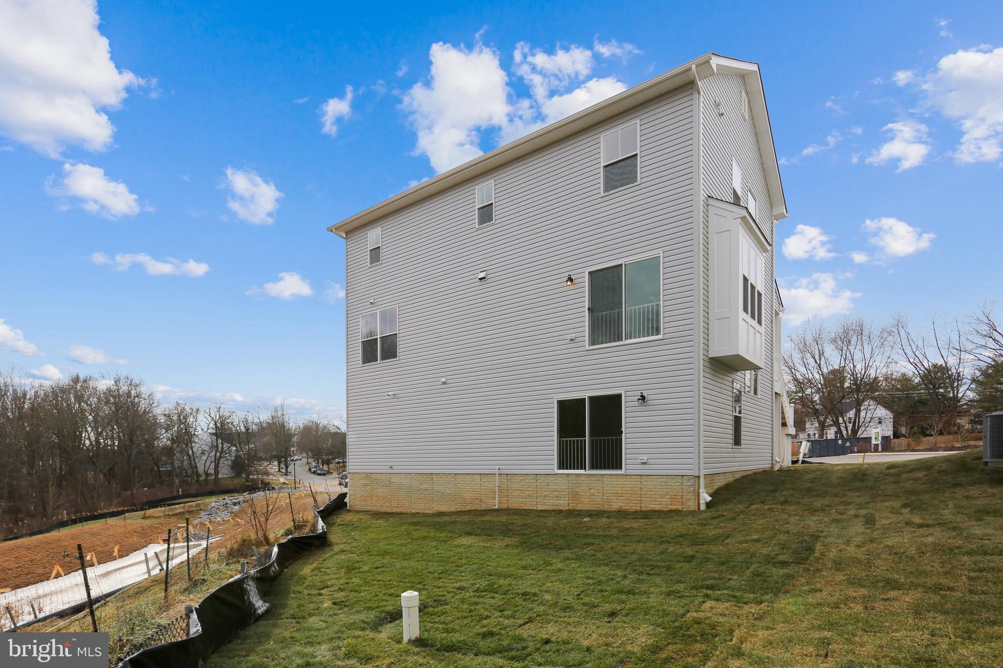 Cornfield Road Pasadena, MD 21122 - Photo 3 of 37 a view of a house with a yard