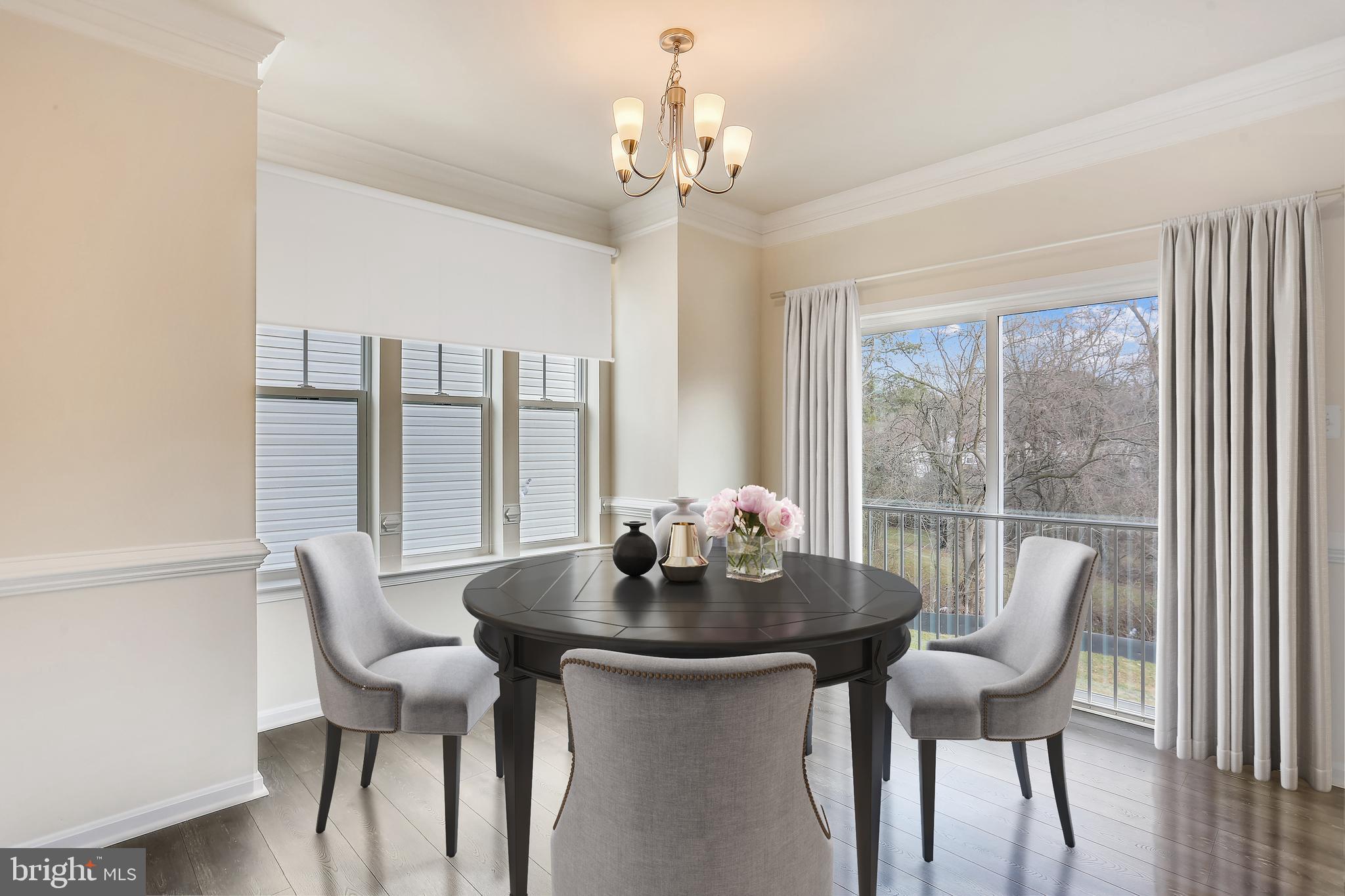 Cornfield Road Pasadena, MD 21122 - Photo 31 of 37 a dining room with furniture and wooden floor