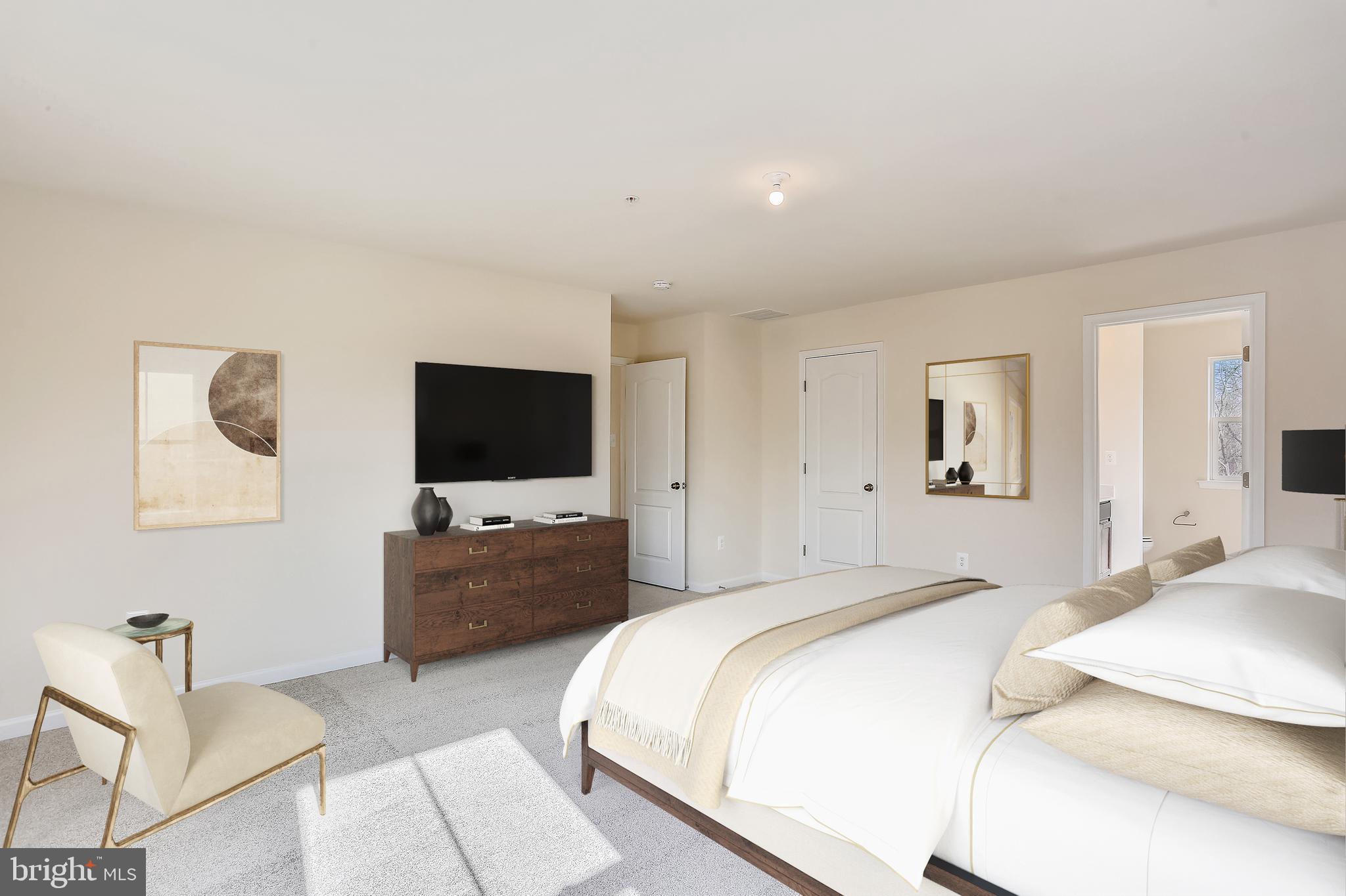 Cornfield Road Pasadena, MD 21122 - Photo 36 of 37 a bedroom with a bed and a flat screen tv