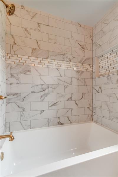 3553 Brodhead Road Monaca, PA 15061 - Photo 11 of 25 Oversized tub out of the box ceramic tile, absolutely gorgeous.