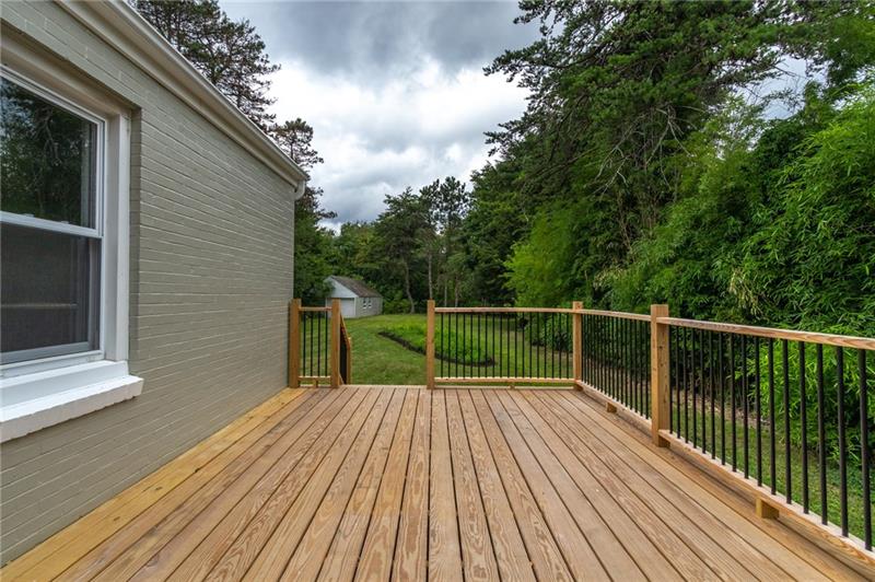 3553 Brodhead Road Monaca, PA 15061 - Photo 16 of 25 Large over sized deck coming out from the living room and onto the back yard.