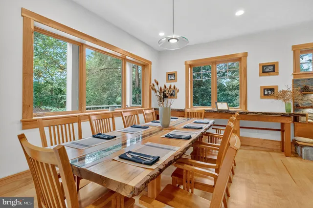 a view of a living room and kitchen with furniture