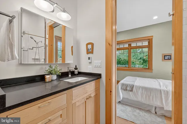 a bathroom with a shower and a toilet