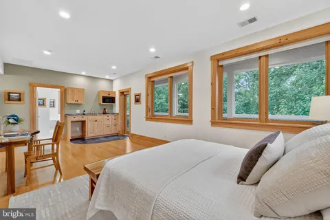 a view of balcony with wooden floor