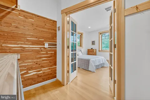 a kitchen with sink and cabinets