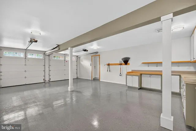 a view of storage and utility room with stairs