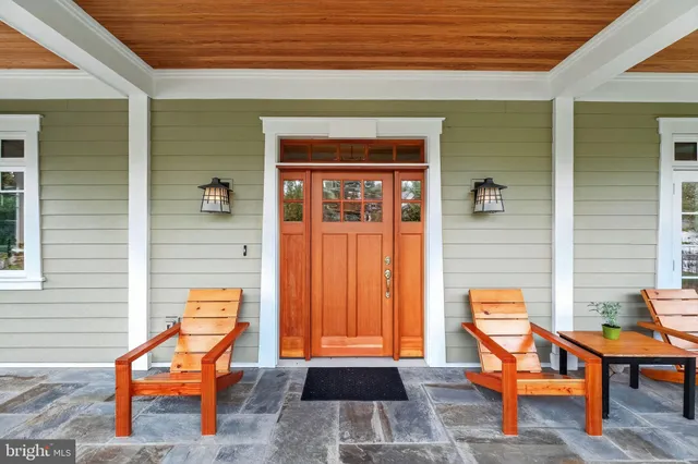 a outdoor space with a furniture and a rug